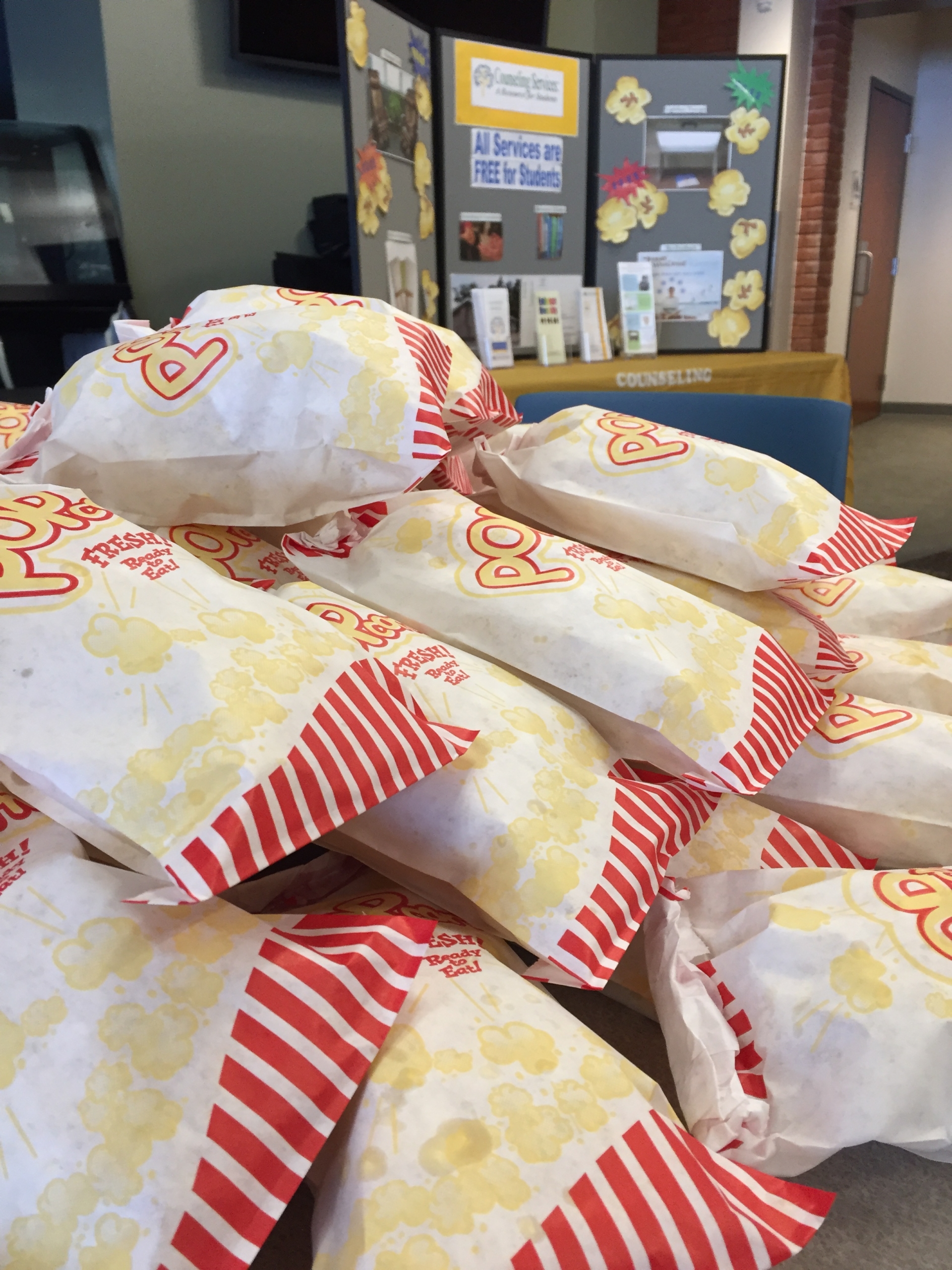 Bags of warm popcorn are passed out to encourage students to 