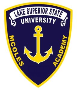 The Lake Superior State University, blue with gold MCOLES Academy patch.