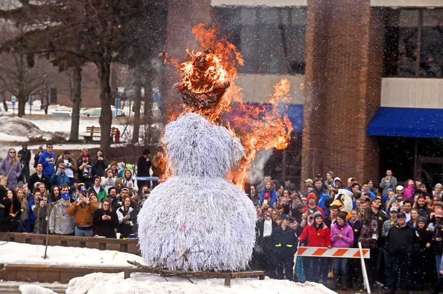 paper snowman ablaze in Cisler Center courtyard