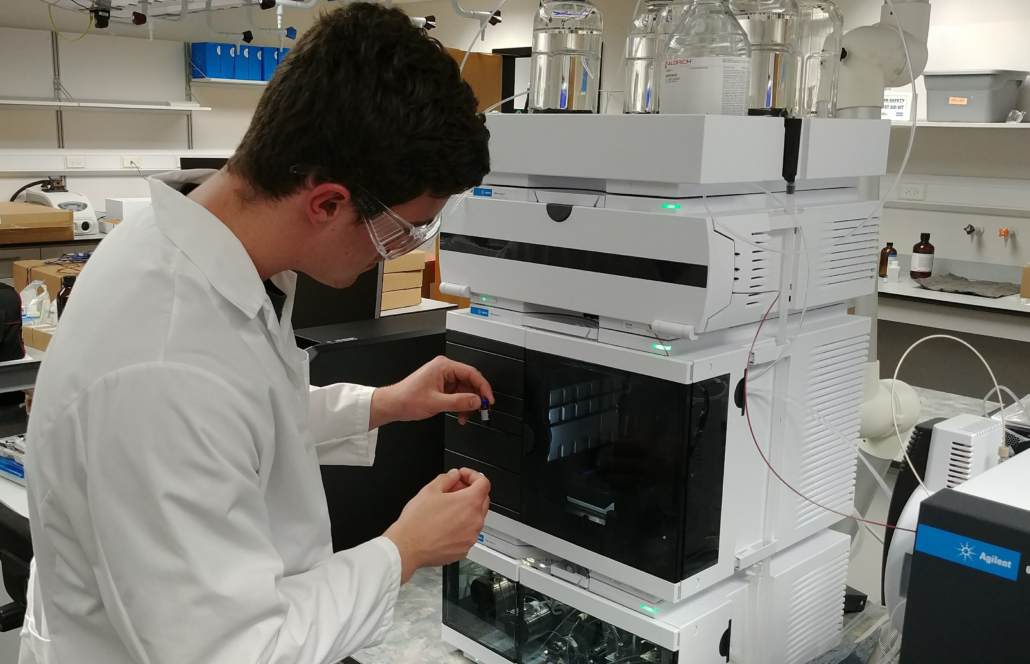 Chemistry student, Justin Blalock, calibrates an Agilent 1290 Ultra-High Pressure Liquid Chromatograph