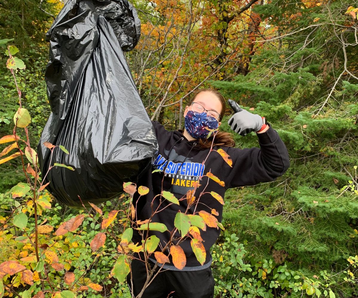 Student with a Trash Bag