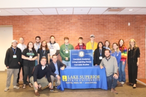 LSSU students and professors and Cambium Analytica personnel celebrate the new cannabis studies living-learning house